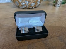 Metal cufflinks with navy case/box. Excellent condition,