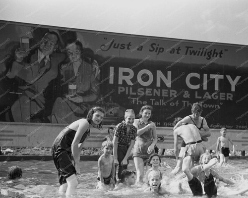 Iron city sign swimming - &,