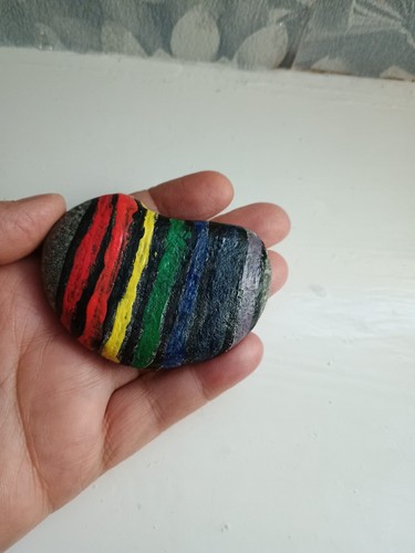 Hand painted pebble - hand,