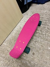 Retro Style Pink Penny Skateboard with Artistic Underdeck