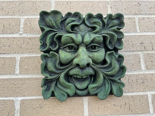 Green man face wall garden - man,