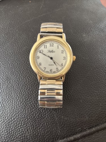 Reflex quartz wristwatch - quartz,