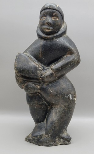 Inuk with seal artist - inuk,