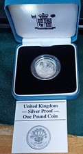 1986 UNITED KINGDOM ROYAL MINT SILVER PROOF ONE POUND COIN IN BLUE CASE WITH COA