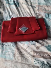 Women's GHD Brand Red Clutch Bag. Used Satisfactory Condition