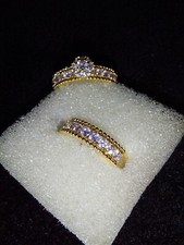 Two 18ct gold plated ladies rings with clear stones UK size J .