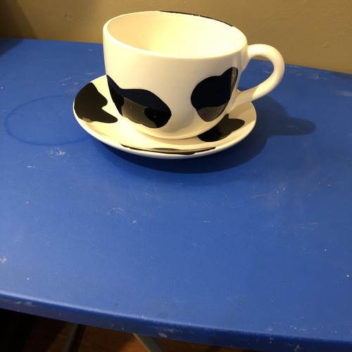 Cow hide print soup and - print,