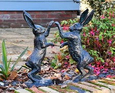 pair of Boxing Hares garden