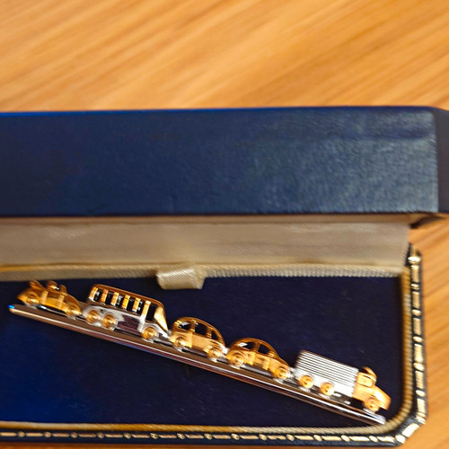 Tie rack signed - tie, gold