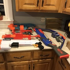 nerf gun lot 5 guns And 1  Bow