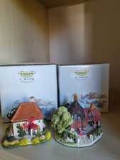 Two Fraser Creations Figurines