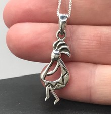 Kokopelli pendant, solid