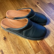 unworn leather clogs
