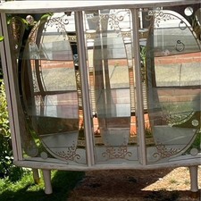 A 1950s Mirrored Back Cabinet