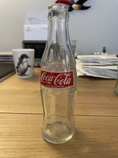 Coca Cola empty glass bottle