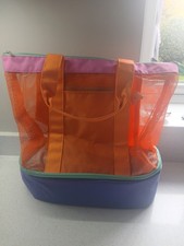 Multicoloured mesh insulated cooler backpack with a zippered main compartment