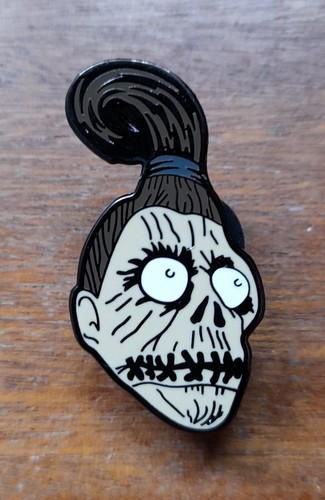 Shrunken head metal enamel - head,