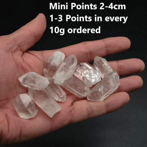 Clear quartz point rough - point,