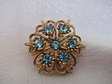 Hollywood Gold Tone Brooch with Light Blue Stones - Signed
