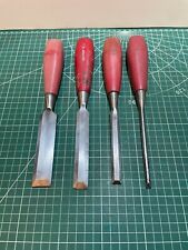 NICE SET OF 4 GRADUATED FOOTPRINT RED HANDLED WOOD BEVEL EDGE CHISELS