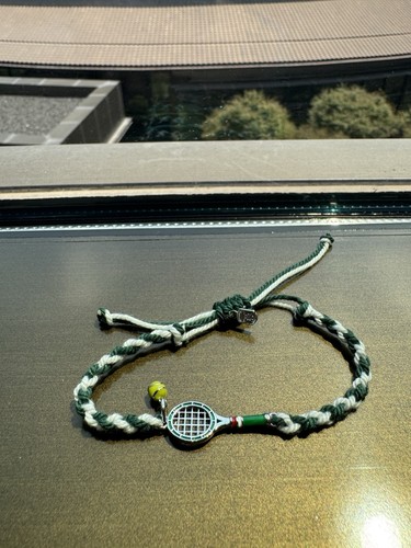 Green and white unisex braided
