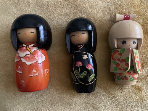 Three kokeshi dolls kunio - kokeshi,
