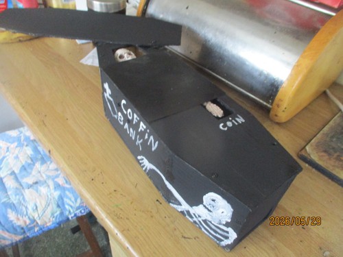 Coffin coin savings money - coffin,
