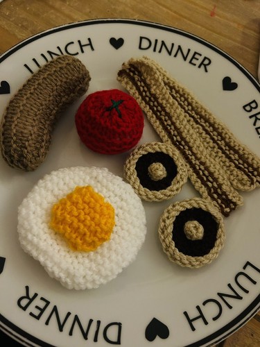 Hand knitted big - hand, breakfast