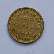 "RHINO AIR - COIN OP AIR AND WATER MACHINE" TOKEN (HAYES 321A)