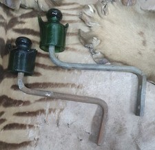 Two Glass insulators complete with brackets - Deep Bottle Green Insulators