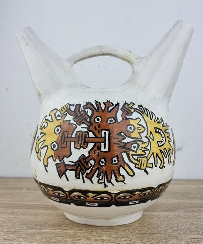 Double spout and bridge - and, vessel