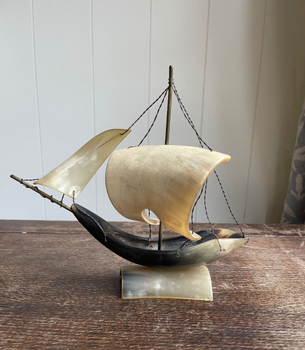 Hand carved horn sailing - hand, ship