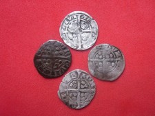 4 Various silver hammered medieval pennies.
