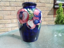 MOORCROFT POTTERY  ANEMONE  ON  BLUE PATTERN VASE . 6" HIGH