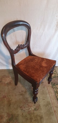Rounded back brown cushioned - back,