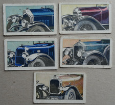 MOTOR CARS AT A GLANCE