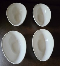 4 Off White Glazed Ceramic Avocado Dishes. Easter Egg Shaped with Wavy Rim.
