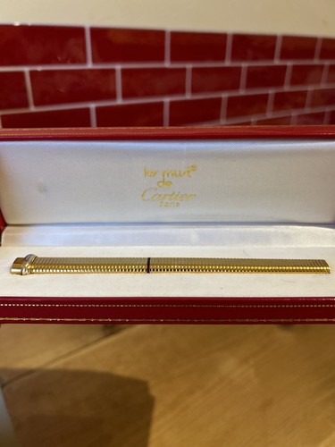 Cartier must de - -,