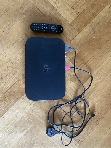 Sky box and remote used - and,