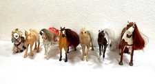 Lot of 7 Toy Horses -