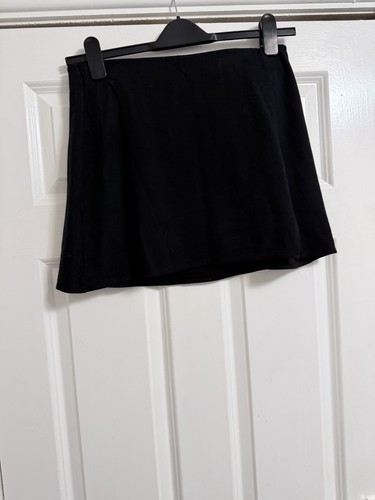 Black skirt featuring - skirt,