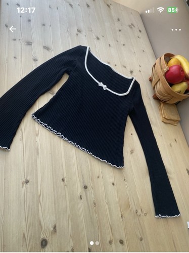 Black jumper with - with, white