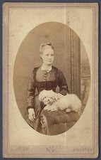 Young lady with terrier dog -