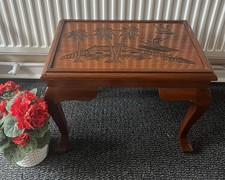 SMALL SOLID WOOD LOW LEVEL SIDE TABLE CARVED CHINESE SCENE TO THE TOP.