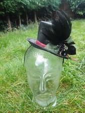 Tiny Top Hat Skellinton Hand, Crow feathers and Black flowers tied with blood r