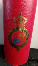 cristy’s London red storage tube Vintage Cardboard 11" Tall Cylindrical 