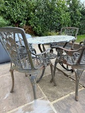 Vintage cast iron table and 4