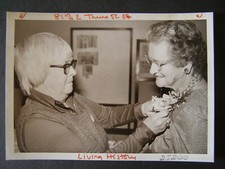 Glossy Press Photo 1980 Harriett Wittenborg pins orchid on Margaret B Southworth
