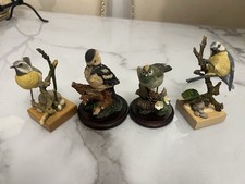 collection of bird figurines, likely from "The Country Bird Collection"(4)