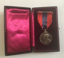 GEORGE V IMPERIAL SERVICE MEDAL (CORONATION ROBES) IN ORIGINAL CASE
